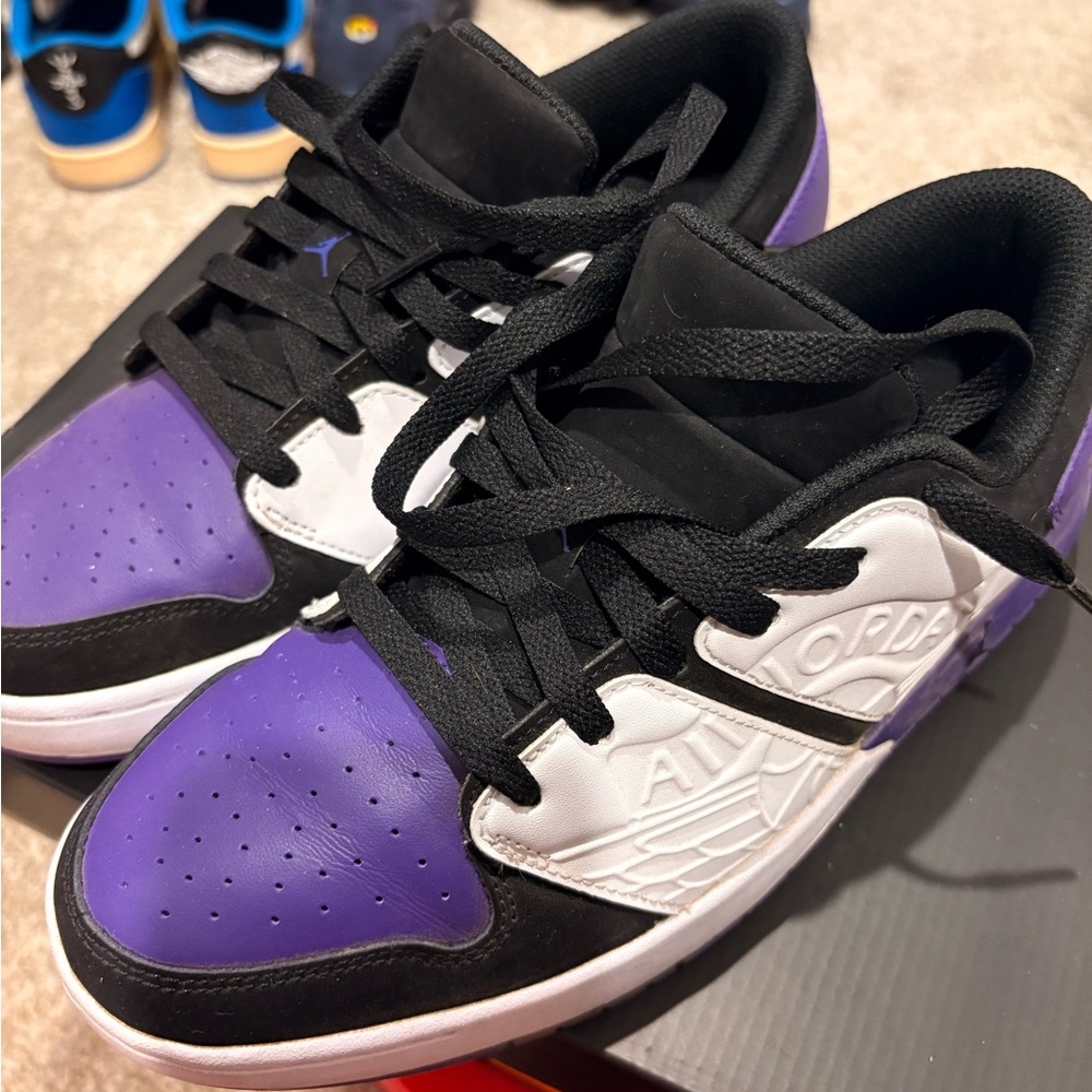 Air Jordan Purple and Black Sneakers